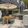 outdoor courtyard with trees and seating