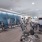 large room with lots of exercise equipment