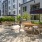 outdoor courtyard with trees and seating