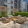 outdoor courtyard with trees and seating
