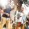 A group of friends hanging out and laughing surrounded by palm trees